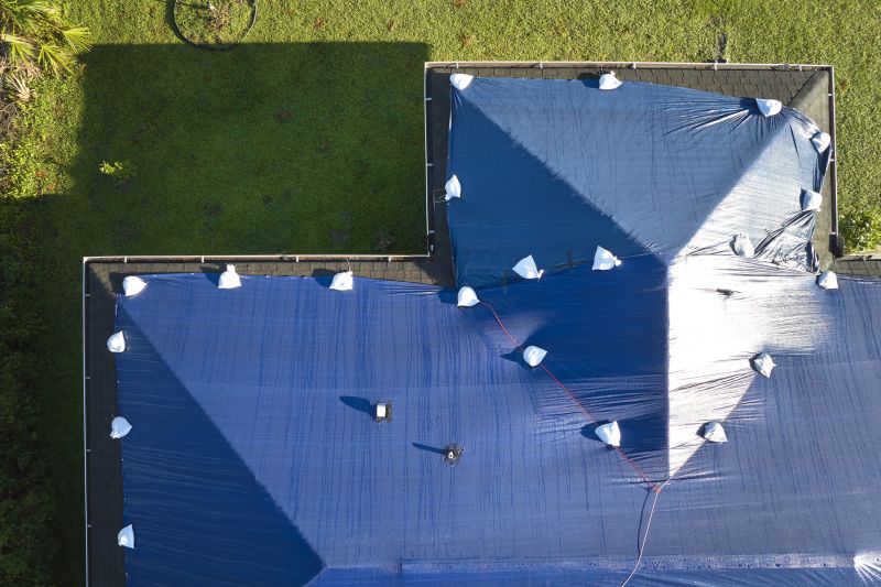 Storm Damage Roof Tarping in Livingston County, MI
